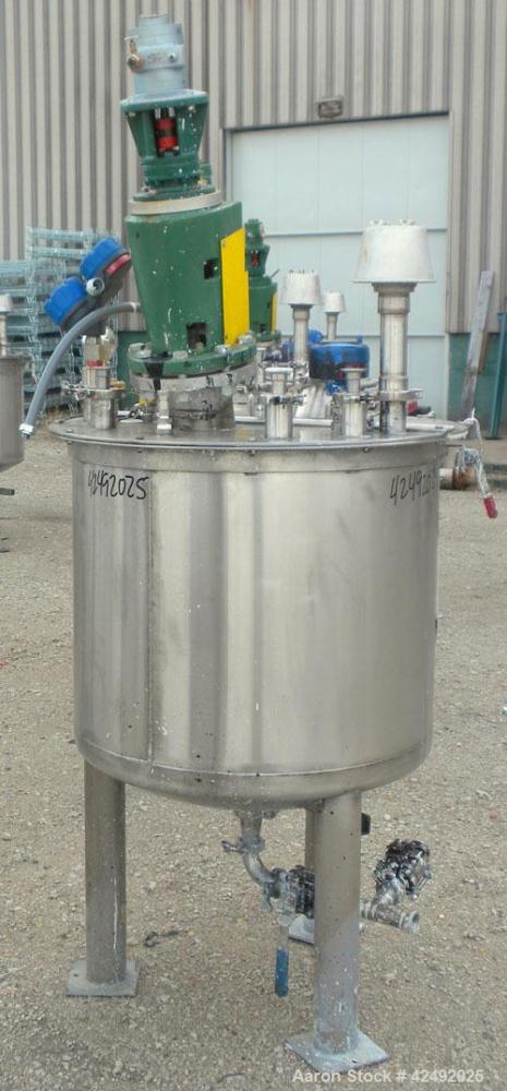Used Tank, 80 Gallon, 304 Stainless Steel, Vertical. 30" Diameter x 24" straight side. Open top with a 2 piece cover, 1/2 bolt on, 1/2 clamp, dished bottom. Off center top entering Lightnin air opera...