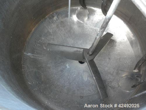 Used Tank, 80 Gallon, 304 Stainless Steel, Vertical. 30" Diameter x 24" straight side. Open top with a 2 piece cover, 1/2 bolt on, 1/2 clamp, dished bottom. Off center top entering Lightnin air opera...