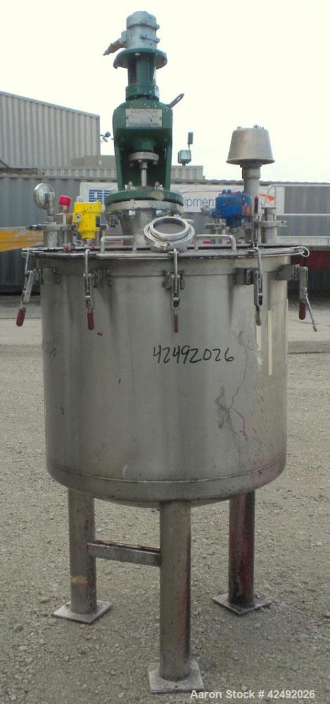 Used Tank, 80 Gallon, 304 Stainless Steel, Vertical. 30" Diameter x 24" straight side. Open top with a 2 piece cover, 1/2 bolt on, 1/2 clamp, dished bottom. Off center top entering Lightnin air opera...