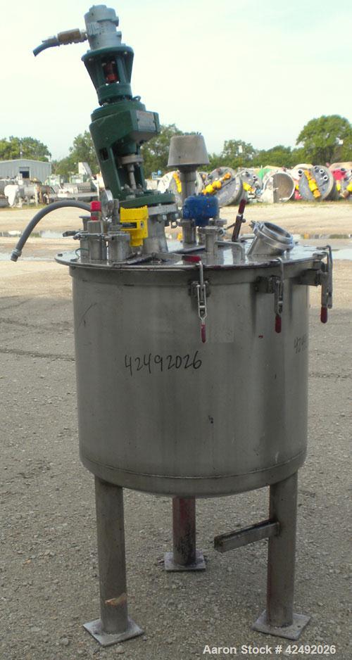Used Tank, 80 Gallon, 304 Stainless Steel, Vertical. 30" Diameter x 24" straight side. Open top with a 2 piece cover, 1/2 bolt on, 1/2 clamp, dished bottom. Off center top entering Lightnin air opera...