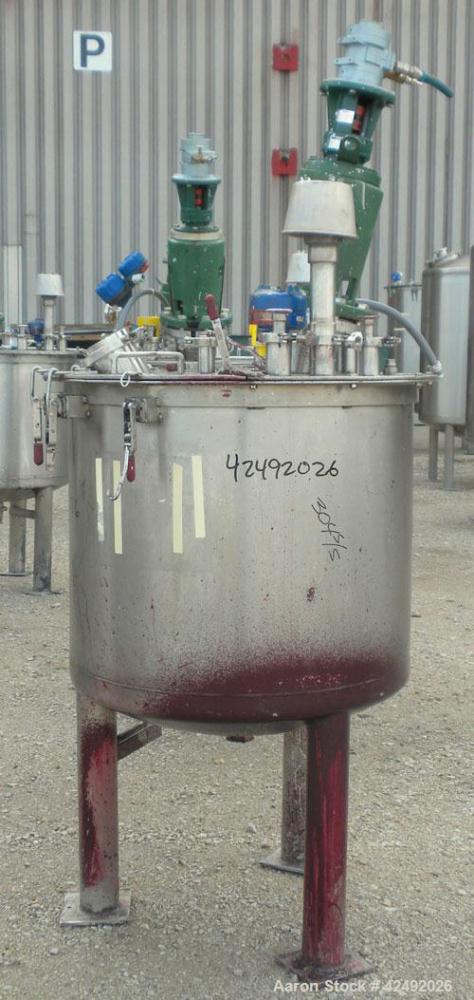 Used Tank, 80 Gallon, 304 Stainless Steel, Vertical. 30" Diameter x 24" straight side. Open top with a 2 piece cover, 1/2 bolt on, 1/2 clamp, dished bottom. Off center top entering Lightnin air opera...