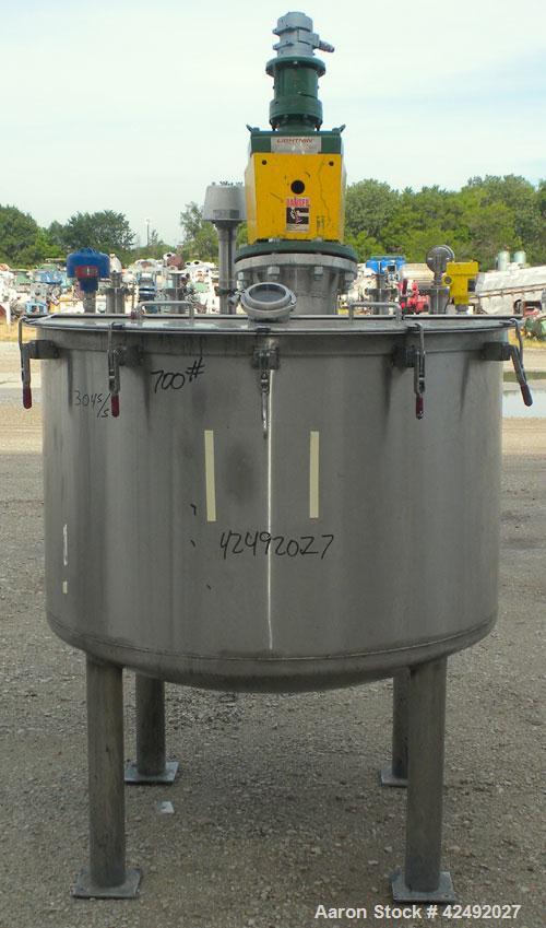 Used Tank, 250 Gallon, 304 Stainless Steel, Vertical. 48" Diameter x 28" straight side. Open top with a 2 piece cover, 1/2 bolt on, 1/2 clamp, dished bottom. Off center top entering Lightnin air oper...