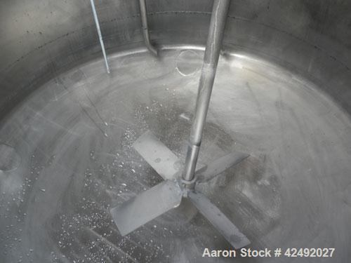 Used Tank, 250 Gallon, 304 Stainless Steel, Vertical. 48" Diameter x 28" straight side. Open top with a 2 piece cover, 1/2 bolt on, 1/2 clamp, dished bottom. Off center top entering Lightnin air oper...