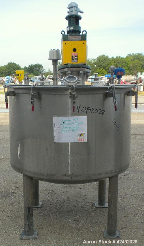Used Tank, 250 Gallon, 304 Stainless Steel, Vertical. 48" Diameter x 28" straight side. Open top with a 2 piece cover, 1/2 bolt on, 1/2 clamp, dished bottom. Off center top entering Lightnin air oper...