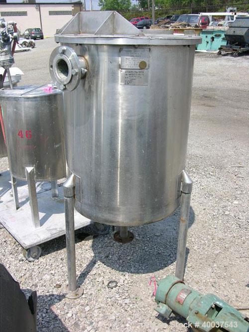 Used Thermo Craft Tank, 65 gallon, stainless steel, vertical. 26" diameter x 33" straight side, open top with a 2 piece cover, dished bottom. 1 1/2" center bottom outlet. Mounted on 3 stainless steel...