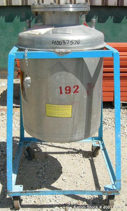 Used O.G. Kelley Co. Pressure Tank, 55 gallon, 304 stainless steel, vertical. 24" diameter x 27" straight side, dished top and bottom. Internal rated 50 psi at 300 deg F. Openings: top 10" with cover...