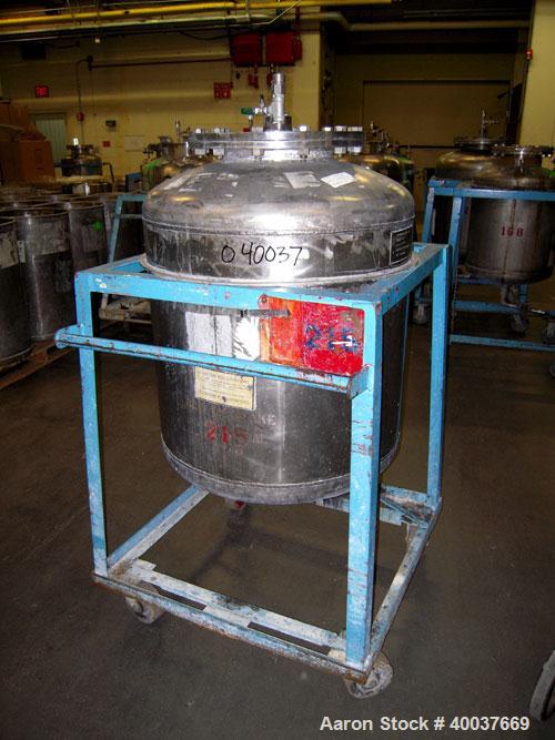 Used Buckley Iron Works Pressure Tank, 100 gallon, stainless steel, vertical. 30'' diameter x 28'' straight side, dished top and bottom. Internal rated 50 psi at 300 deg F. Openings: top approximate ...