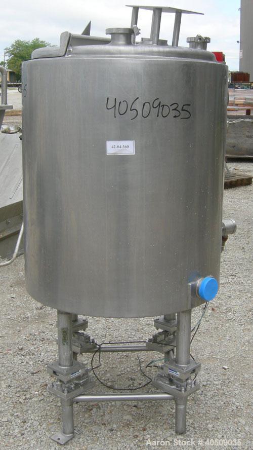 Used Tank, 100 gallon, 321 stainless steel, vertical. 30" diameter x 35" straight side. Flat top with 1/2 hinged cover, sloped bottom. Openings: top 4", (2) 3" tri-clamp; 3" tri-clamp side bottom out...