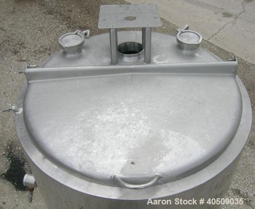 Used Tank, 100 gallon, 321 stainless steel, vertical. 30" diameter x 35" straight side. Flat top with 1/2 hinged cover, sloped bottom. Openings: top 4", (2) 3" tri-clamp; 3" tri-clamp side bottom out...