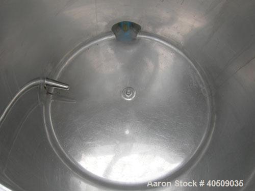 Used Tank, 100 gallon, 321 stainless steel, vertical. 30" diameter x 35" straight side. Flat top with 1/2 hinged cover, sloped bottom. Openings: top 4", (2) 3" tri-clamp; 3" tri-clamp side bottom out...