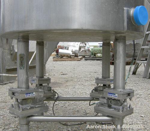 Used Tank, 100 gallon, 321 stainless steel, vertical. 30" diameter x 35" straight side. Flat top with 1/2 hinged cover, sloped bottom. Openings: top 4", (2) 3" tri-clamp; 3" tri-clamp side bottom out...