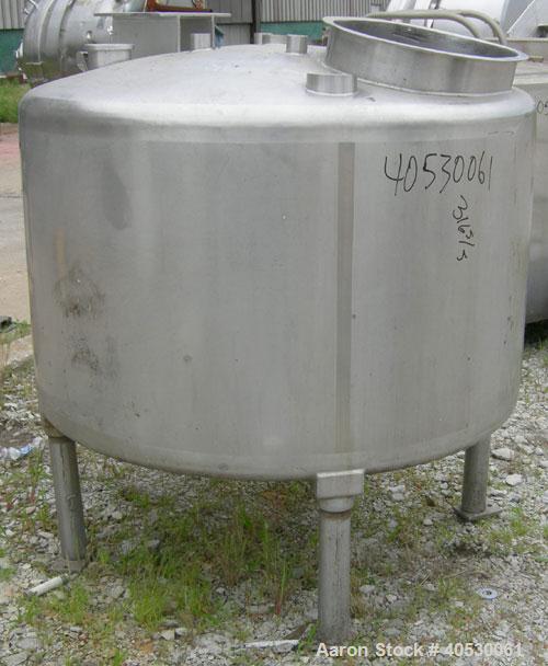 Used Tank, 300 Gallon, 316 Stainless Steel, Vertical. Approximately 52" diameter x 30" straight side, dished top and bottom. Openings: top 3", 4", 4 1/2", 10", 16" x 20" manway, no cover; approximate...