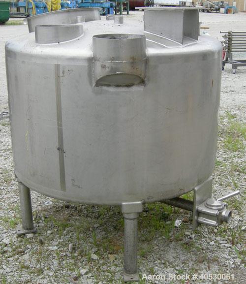 Used Tank, 300 Gallon, 316 Stainless Steel, Vertical. Approximately 52" diameter x 30" straight side, dished top and bottom. Openings: top 3", 4", 4 1/2", 10", 16" x 20" manway, no cover; approximate...