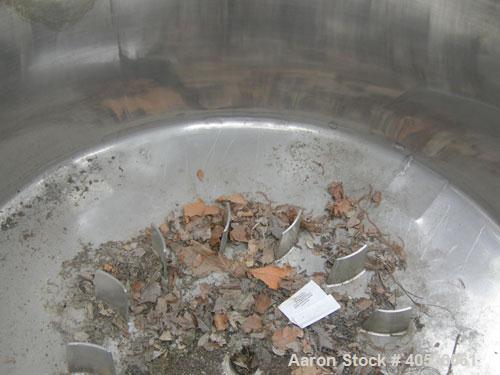 Used Tank, 300 Gallon, 316 Stainless Steel, Vertical. Approximately 52" diameter x 30" straight side, dished top and bottom. Openings: top 3", 4", 4 1/2", 10", 16" x 20" manway, no cover; approximate...