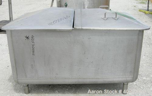 Used - Tank, 300 gallon, 304 stainless steel, rectangular. 42" wide x 60" long x 28" deep. Open top with (2) removable covers, sloped bottom. 2 1/4" end bottom outlet. Mounted on 4 stainless steel le...