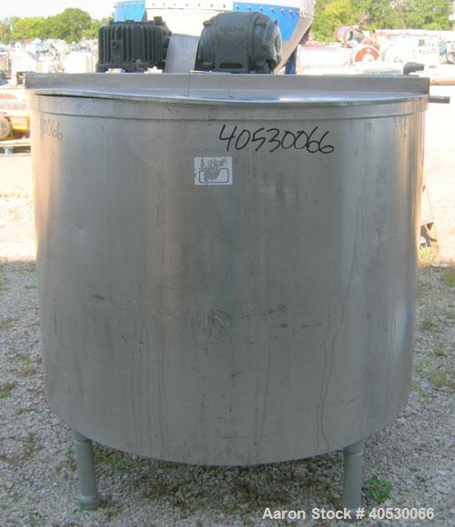 Used Tank, 425 gallon, 316 stainless steel, vertical. Approximately 54" diameter x 44" straight side. Open top with (2) 1/3 covers, sloped bottom. Fixed stainless steel agitator bridge. Off center to...