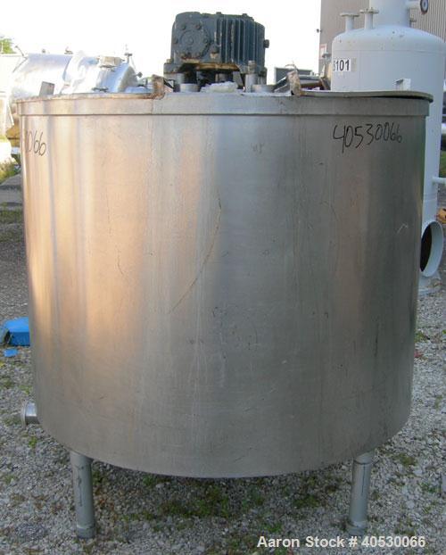 Used Tank, 425 gallon, 316 stainless steel, vertical. Approximately 54" diameter x 44" straight side. Open top with (2) 1/3 covers, sloped bottom. Fixed stainless steel agitator bridge. Off center to...