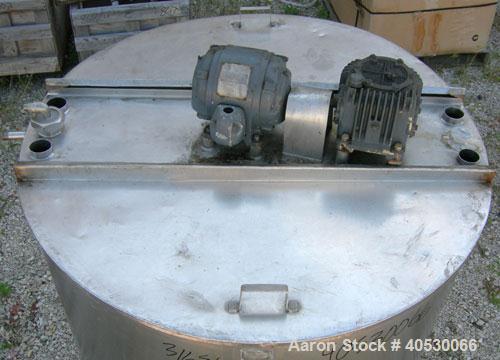 Used Tank, 425 gallon, 316 stainless steel, vertical. Approximately 54" diameter x 44" straight side. Open top with (2) 1/3 covers, sloped bottom. Fixed stainless steel agitator bridge. Off center to...