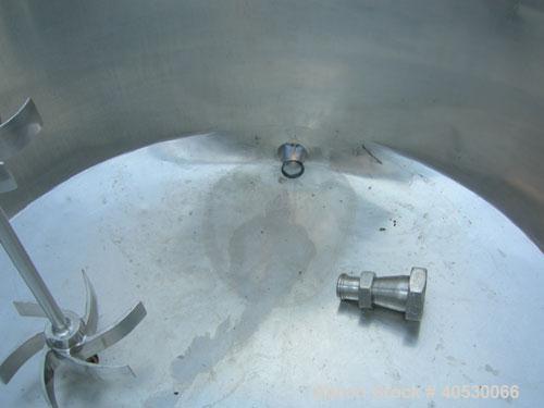 Used Tank, 425 gallon, 316 stainless steel, vertical. Approximately 54" diameter x 44" straight side. Open top with (2) 1/3 covers, sloped bottom. Fixed stainless steel agitator bridge. Off center to...