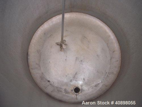 Used Tank, 90 gallon, 304 stainless steel. 30" diameter x 30" straight side, open top with cover, flat sloping bottom. Clamp on air operated Lightnin agitator, 1/2" diameter shaft with (2) 3 blade pr...