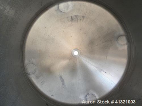 Used Tank, 375 Gallon, 304 Stainless Steel, Vertical. Approximately 46" diameter x 48" straight side, dish top and bottom. Openings top 18" manway, no cover, (2) 4" tri-clamp, (2) 2" tri-clamp, 8" of...