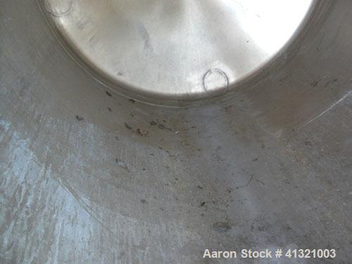 Used Tank, 375 Gallon, 304 Stainless Steel, Vertical. Approximately 46" diameter x 48" straight side, dish top and bottom. Openings top 18" manway, no cover, (2) 4" tri-clamp, (2) 2" tri-clamp, 8" of...