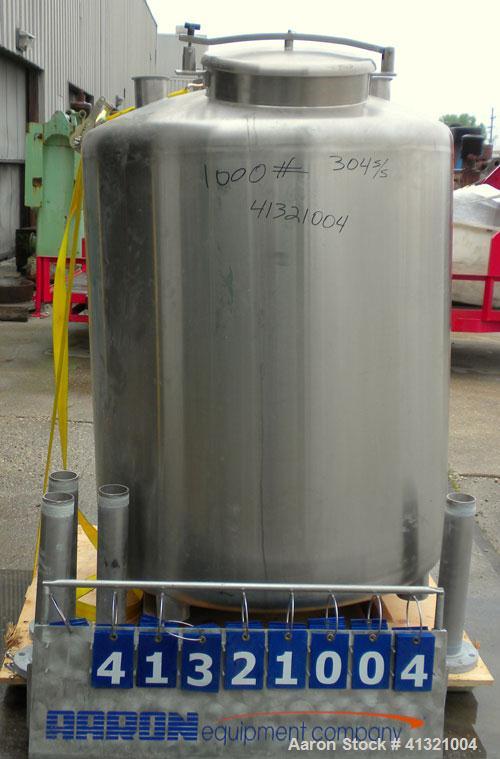 Used Tank, 375 Gallon, 304 Stainless Steel, Vertical. Approximately 46" diameter x 48" straight side, dish top and bottom. Openings top 18" manway, no cover, (2) 4" tri-clamp, (2) 2" tri-clamp, 8" of...