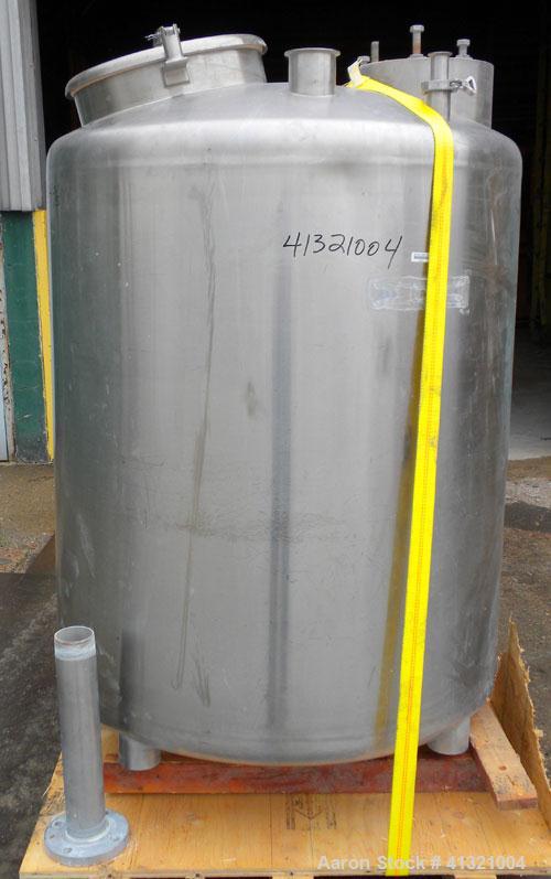Used Tank, 375 Gallon, 304 Stainless Steel, Vertical. Approximately 46" diameter x 48" straight side, dish top and bottom. Openings top 18" manway, no cover, (2) 4" tri-clamp, (2) 2" tri-clamp, 8" of...
