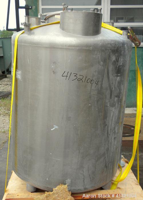 Used Tank, 375 Gallon, 304 Stainless Steel, Vertical. Approximately 46" diameter x 48" straight side, dish top and bottom. Openings top 18" manway, no cover, (2) 4" tri-clamp, (2) 2" tri-clamp, 8" of...