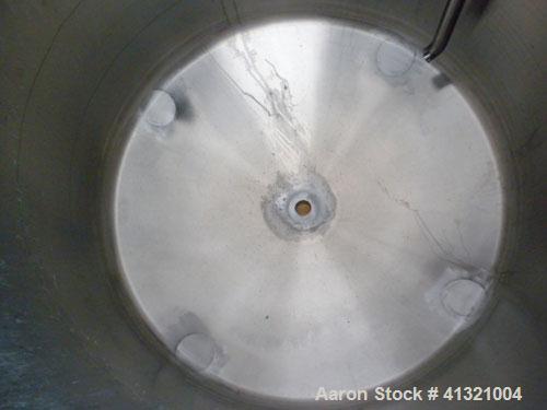 Used Tank, 375 Gallon, 304 Stainless Steel, Vertical. Approximately 46" diameter x 48" straight side, dish top and bottom. Openings top 18" manway, no cover, (2) 4" tri-clamp, (2) 2" tri-clamp, 8" of...