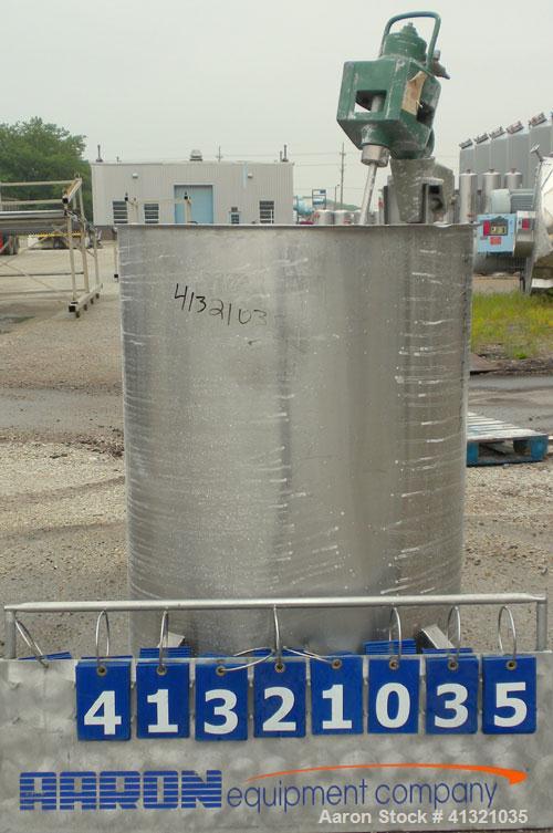 Used Tank, 115 Gallon, 304 Stainless Steel, Vertical. 30" diameter x 38" straight side, flat open top, no cover, sloped bottom. Includes an air operated Lightnin agitator with a 3/4" diameter x 44" l...
