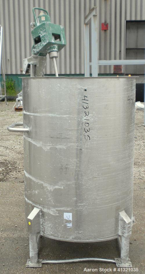 Used Tank, 115 Gallon, 304 Stainless Steel, Vertical. 30" diameter x 38" straight side, flat open top, no cover, sloped bottom. Includes an air operated Lightnin agitator with a 3/4" diameter x 44" l...