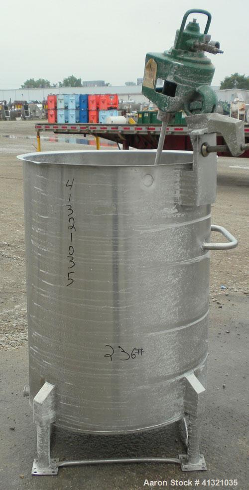 Used Tank, 115 Gallon, 304 Stainless Steel, Vertical. 30" diameter x 38" straight side, flat open top, no cover, sloped bottom. Includes an air operated Lightnin agitator with a 3/4" diameter x 44" l...
