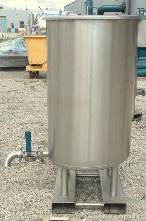 Used Lewis Process Systems Tank, 60 Gallon, 304 Stainless Steel, Vertical. 22" diameter x 36" straight side. Flat open top with removable cover, sloped bottom. 2" sanitary side bottom outlet. Mounted...