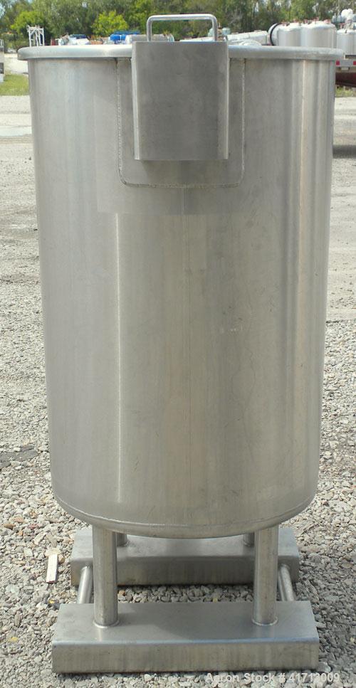 Used Lewis Process Systems Tank, 60 Gallon, 304 Stainless Steel, Vertical. 22" diameter x 36" straight side. Flat open top with removable cover, sloped bottom. 2" sanitary side bottom outlet. Mounted...