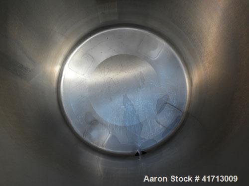 Used Lewis Process Systems Tank, 60 Gallon, 304 Stainless Steel, Vertical. 22" diameter x 36" straight side. Flat open top with removable cover, sloped bottom. 2" sanitary side bottom outlet. Mounted...