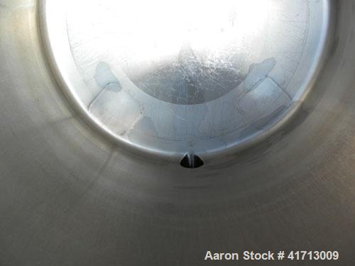 Used Lewis Process Systems Tank, 60 Gallon, 304 Stainless Steel, Vertical. 22" diameter x 36" straight side. Flat open top with removable cover, sloped bottom. 2" sanitary side bottom outlet. Mounted...