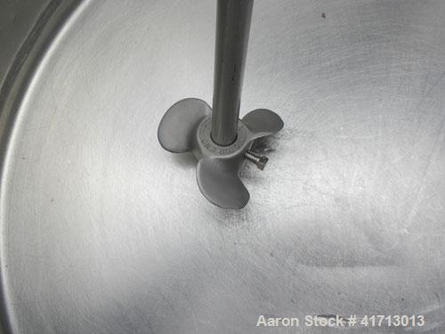 Used Tank, 30 Gallon, 304 stainless steel, vertical. 19" diameter x 23" straight side, flat top with 1 piece hinged cover, sloped bottom. Mixco Mixer clamp on agitator, 5/8" diameter shaft with a 3" ...