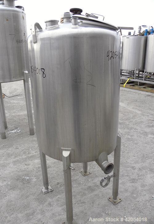 Used- Tank, 100 Gallon, 316 Stainless Steel, Vertical. 30" diameter x 36" straight side, dish top, sloped bottom. 1-1/4" dia...