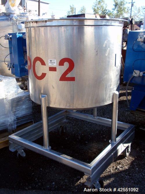 Used Tank, 150 Gallon, Stainless Steel. Approximate 40" diameter x 30" straight side, open top with cover, dished bottom, 2" center bottom outlet, mounted on stainless steel portable frame. PRICE INC...