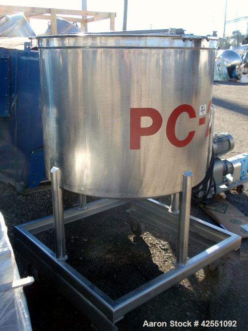 Used Tank, 150 Gallon, Stainless Steel. Approximate 40" diameter x 30" straight side, open top with cover, dished bottom, 2" center bottom outlet, mounted on stainless steel portable frame. PRICE INC...