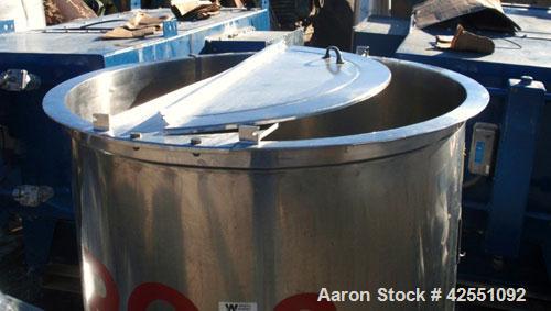 Used Tank, 150 Gallon, Stainless Steel. Approximate 40" diameter x 30" straight side, open top with cover, dished bottom, 2" center bottom outlet, mounted on stainless steel portable frame. PRICE INC...