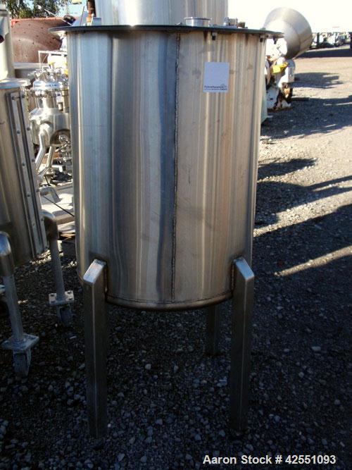 Used Tank, 55 Gallon, Stainless Steel. Approximate 24" diameter x 30" straight side, open top with cover, dished bottom, 2" center bottom outlet, on stainless steel legs. PRICE INCLUDES A 15% BUYERS ...