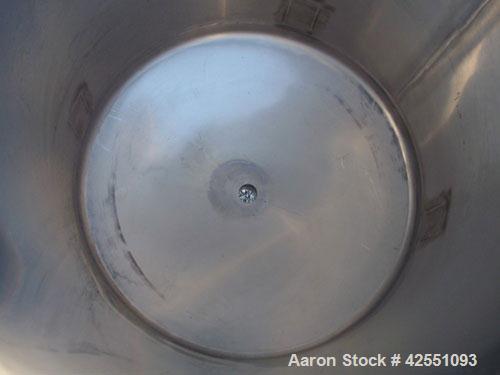 Used Tank, 55 Gallon, Stainless Steel. Approximate 24" diameter x 30" straight side, open top with cover, dished bottom, 2" center bottom outlet, on stainless steel legs. PRICE INCLUDES A 15% BUYERS ...
