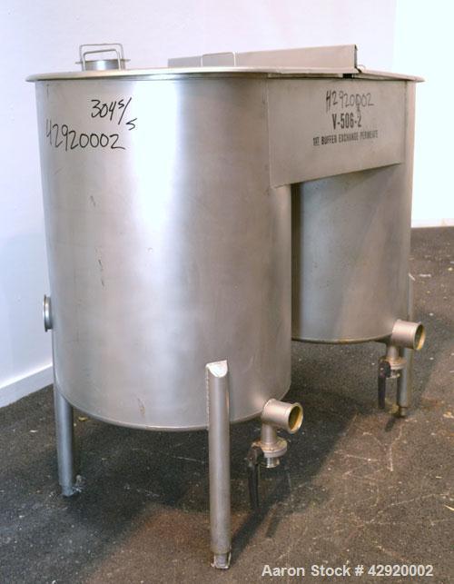 Used Dual Holding Tank, Approximately 200 Total Gallon, 304 Stainless Steel, Vertical. Consisting of (2) 30’’ diameter x 24’’ deep tanks, sloped bottoms. (1) 11’’ deep oval top common section with (2...