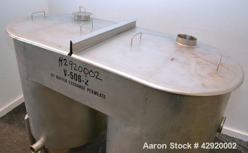 Used Dual Holding Tank, Approximately 200 Total Gallon, 304 Stainless Steel, Vertical. Consisting of (2) 30’’ diameter x 24’’ deep tanks, sloped bottoms. (1) 11’’ deep oval top common section with (2...