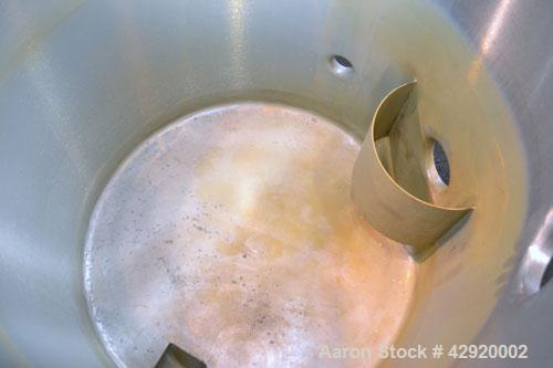 Used Dual Holding Tank, Approximately 200 Total Gallon, 304 Stainless Steel, Vertical. Consisting of (2) 30’’ diameter x 24’’ deep tanks, sloped bottoms. (1) 11’’ deep oval top common section with (2...