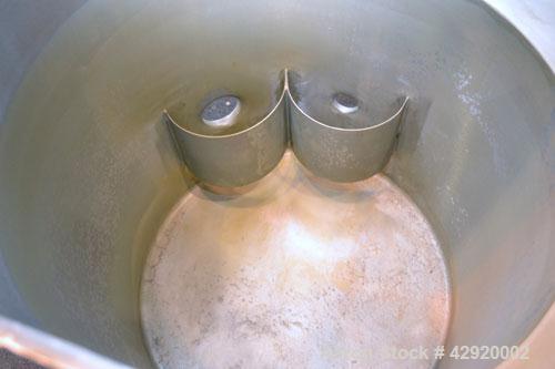Used Dual Holding Tank, Approximately 200 Total Gallon, 304 Stainless Steel, Vertical. Consisting of (2) 30’’ diameter x 24’’ deep tanks, sloped bottoms. (1) 11’’ deep oval top common section with (2...