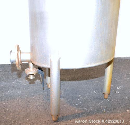Tank, 65 Gallon, 304 Stainless Steel, Vertical. 24-1/2’’ Diameter x 33’’ straight side. Flat open top with a 1 piece cover, sloped bottom. Openings side 2’’, 2-1/2’’ tri-clamp, 3’’ side bottom outlet...