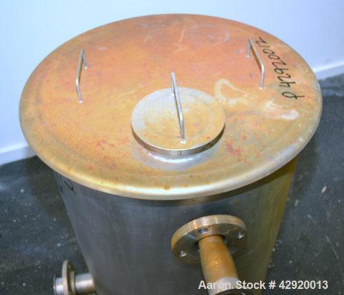 Tank, 65 Gallon, 304 Stainless Steel, Vertical. 24-1/2’’ Diameter x 33’’ straight side. Flat open top with a 1 piece cover, sloped bottom. Openings side 2’’, 2-1/2’’ tri-clamp, 3’’ side bottom outlet...